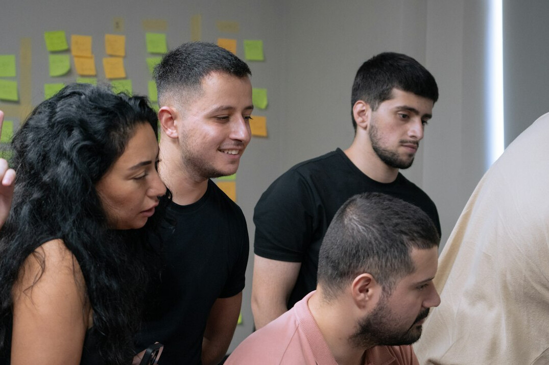 diverse group discussing ideas